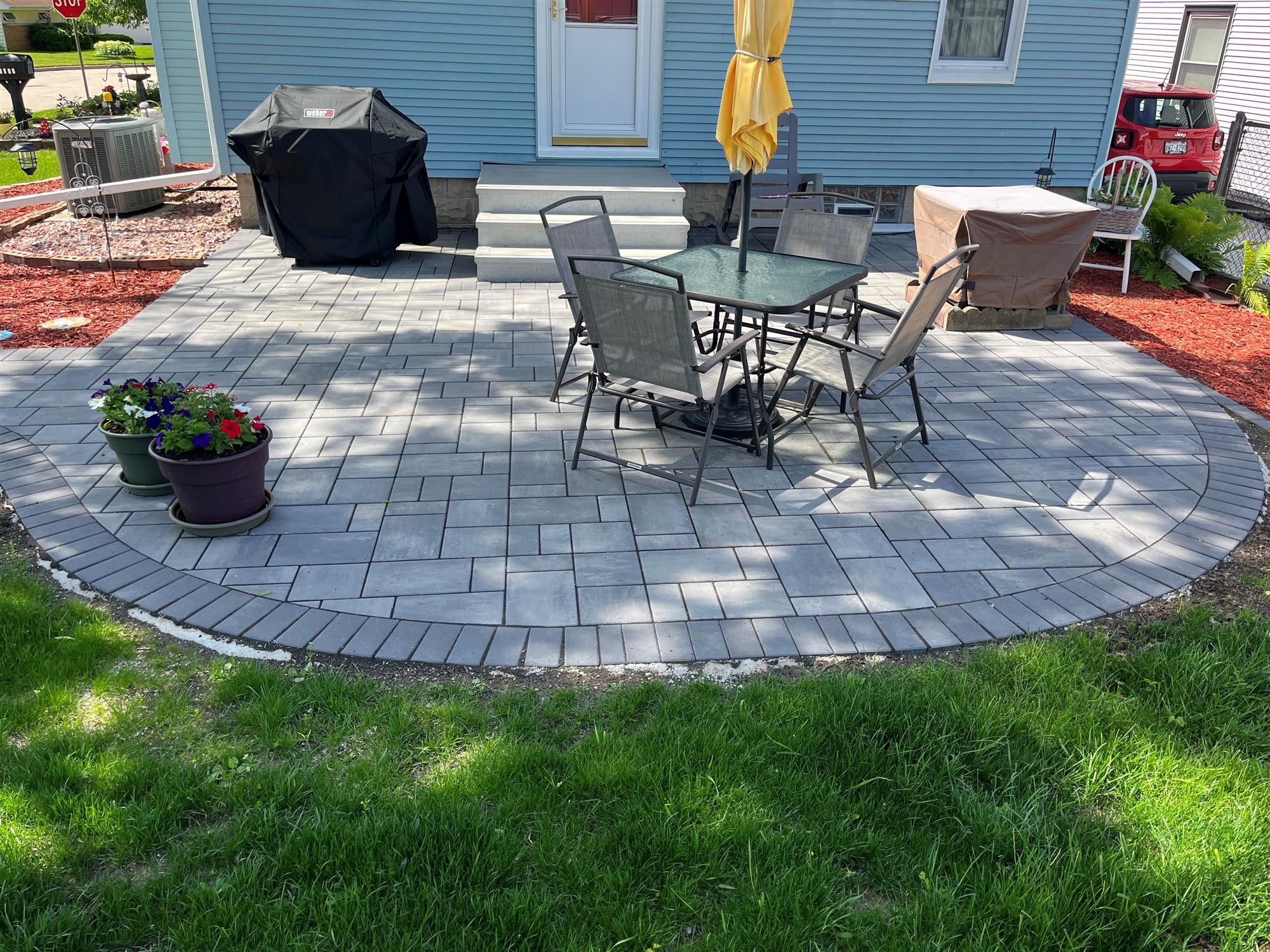 Artistic Patio with Intricate Paver Patterns